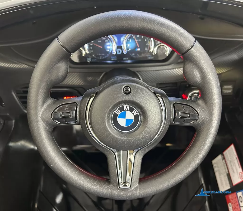 Coche electrico para niños BMW X6M Negro Metalizado volante