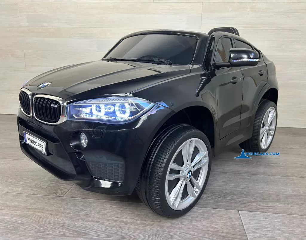 Coche electrico para niños BMW X6M Negro Metalizado vista frontal derecha