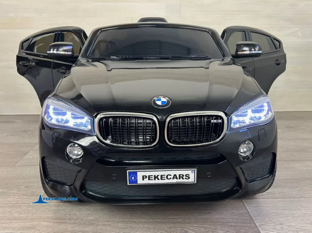 Coche electrico para niños BMW X6M Negro Metalizado puertas abiertas