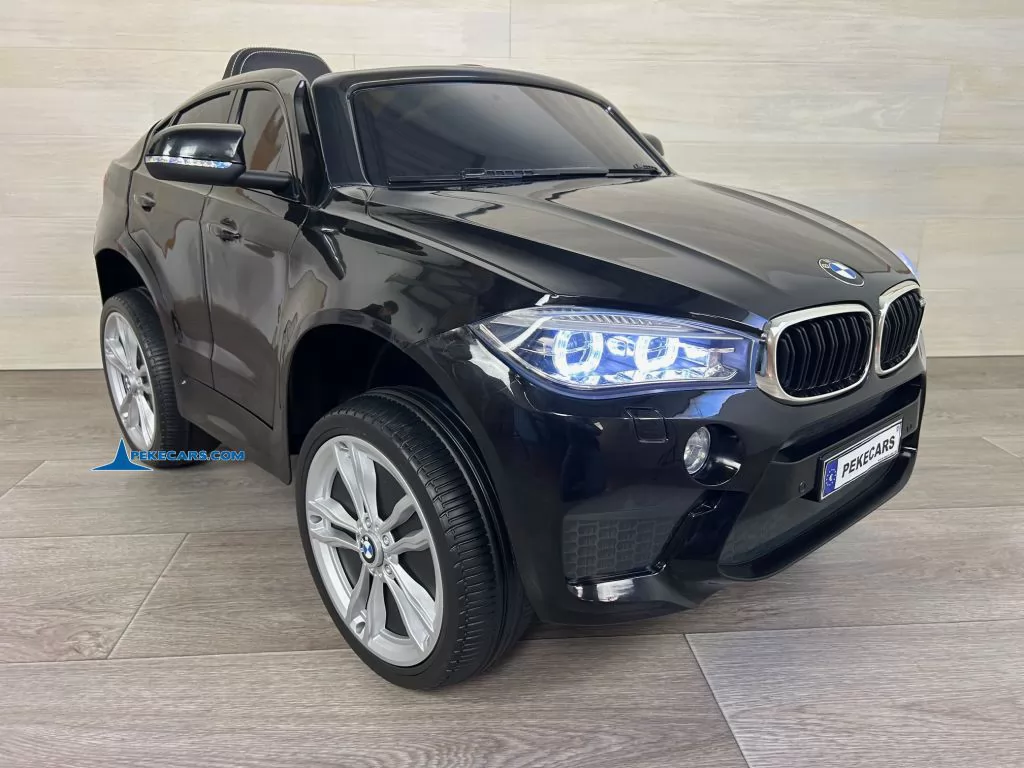 Coche electrico para niños BMW X6M Negro Metalizado vista lado izquierdo