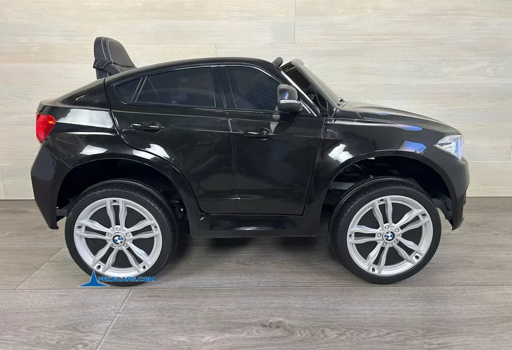 Coche electrico para niños BMW X6M Negro Metalizado vista lateral izquierdo