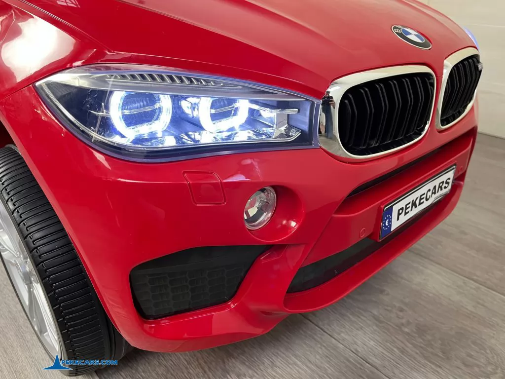 Coche electrico para niños BMW X6M Rojo luces frontales