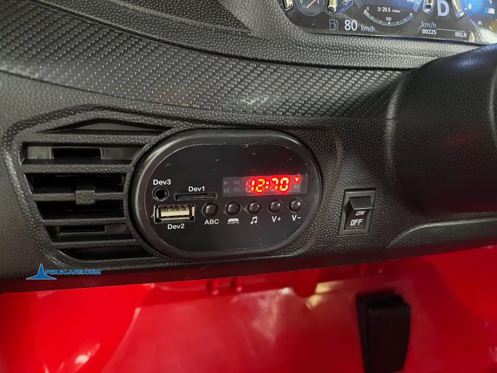 Coche electrico para niños BMW X6M Rojo reproducto de musica mp3