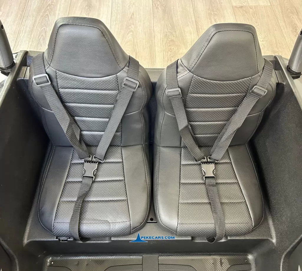 Buggy 1000R 24V Negro asientos polipiel dos ninos