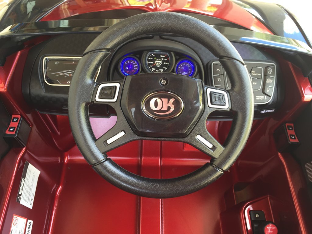 Coche electrico Infantil Bugatti Veyron Style Burdeos Metalizado volante con musica y claxon