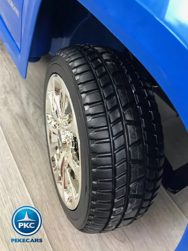 JEEP para niños Grand Cherokee 12V azul metalizado rueda de caucho