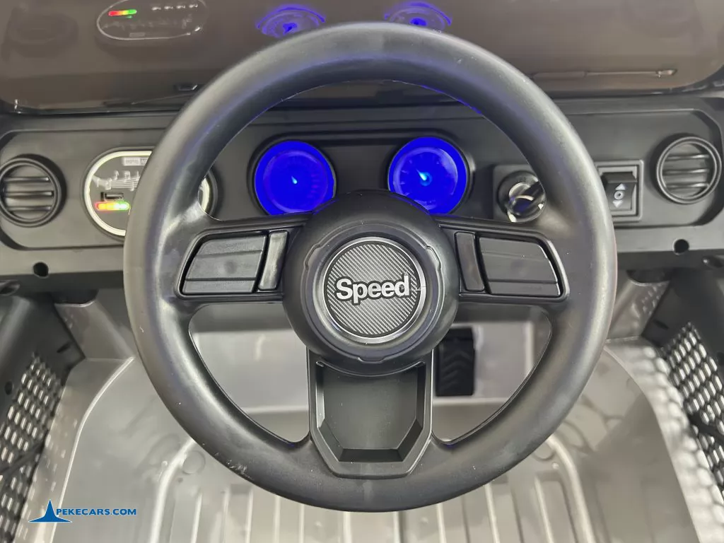 Jeep Wrangler Rubicon Style 12V 2.4G Plata Metalizado volante