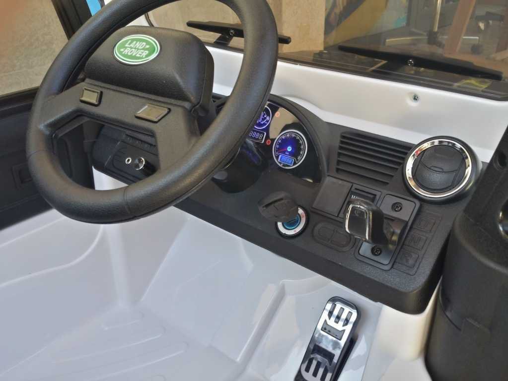 Todoterreno electrico infantil Land Rover Defender Blanco llave de arranque