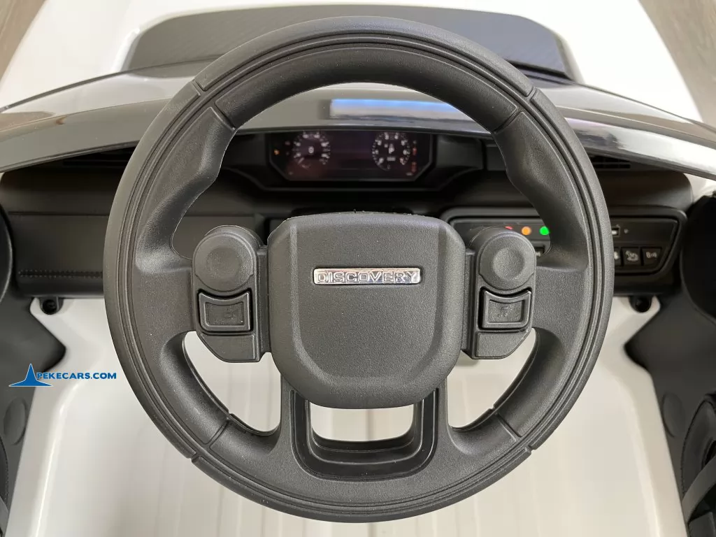 coches teledirigidos land rover discovery 12v blanco volante