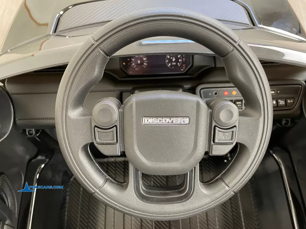 coches teledirigidos land rover discovery 12v negro metalizado volante