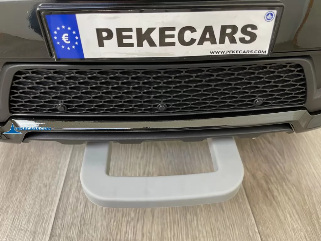 coches teledirigidos land rover discovery 12v negro metalizado asa delantera