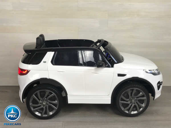 Coche eléctrico para niños Land Rover Discovery 12V MP4 blanco vista lateral