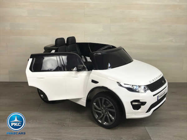 Coche eléctrico para niños Land Rover Discovery 12V MP4 blanco vista de lado