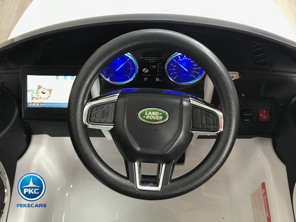 Coche eléctrico para niños Land Rover Discovery 12V MP4 blanco vista volante