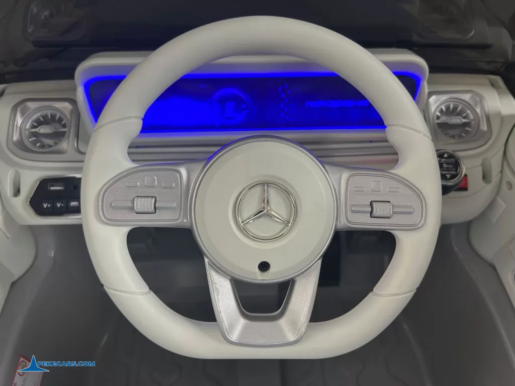 Mercedes benz EQG Gris metalizado coche electricos para niños volante