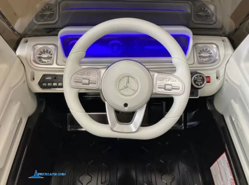 Mercedes benz EQG negro metalizado coche electricos para niños volante