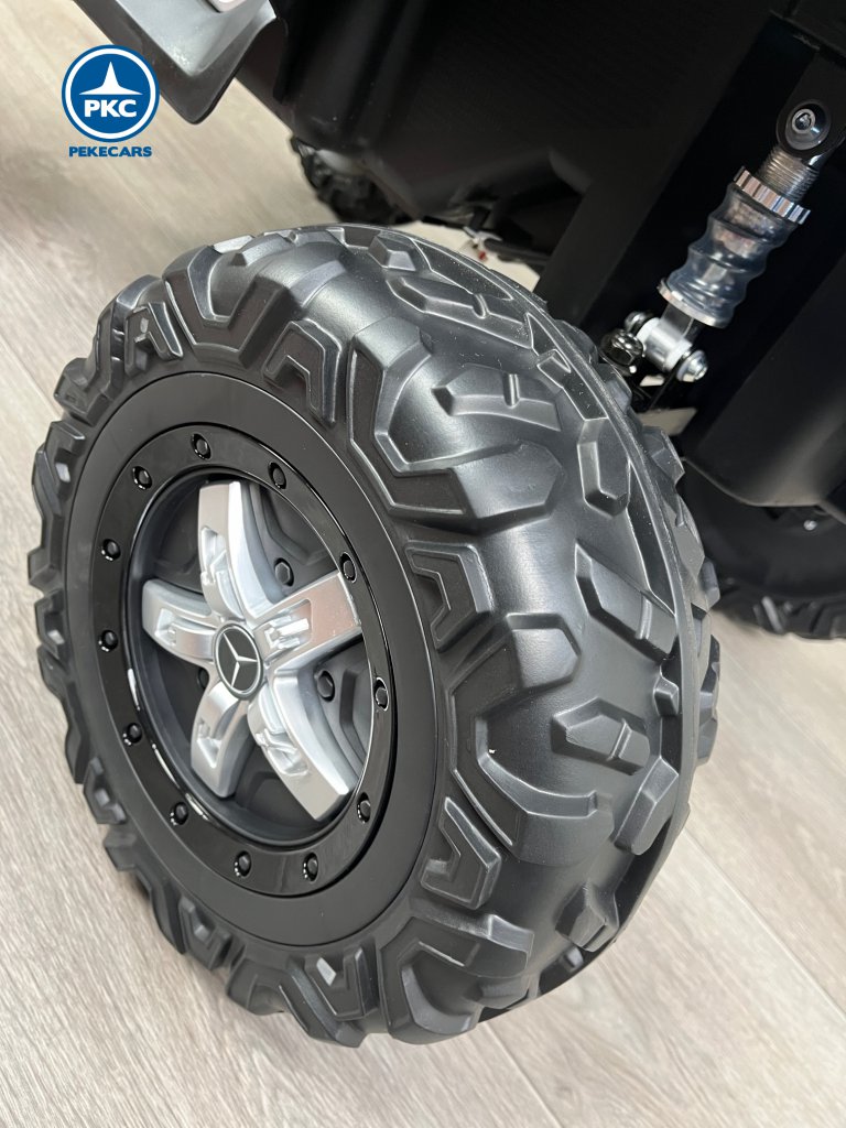 Todoterreno Mercedes Unimog 12v negro rueda de caucho