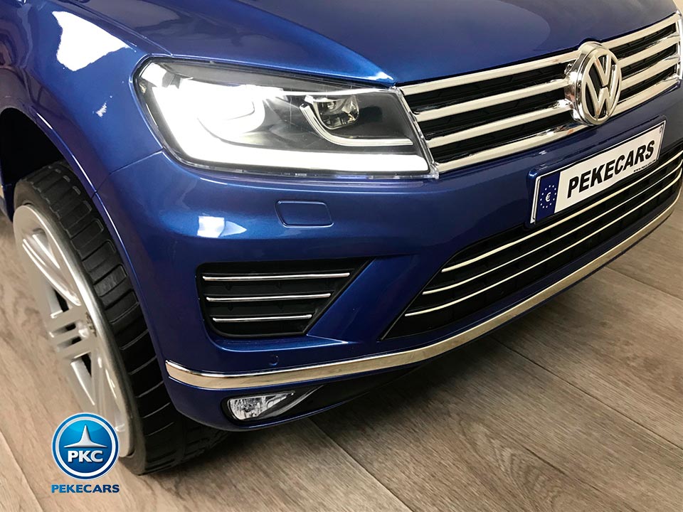 Coche electrico para niños Volkswagen Touareg MP4 Azul Metalizado vista delantera faro