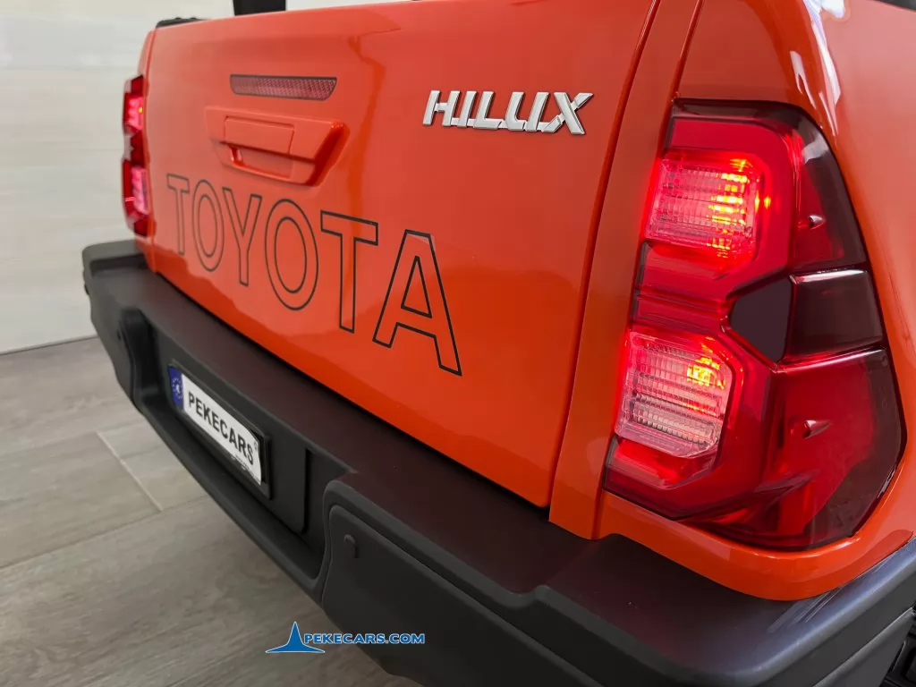 coche electrico niños toyota hilux mp4 naranja metalizado