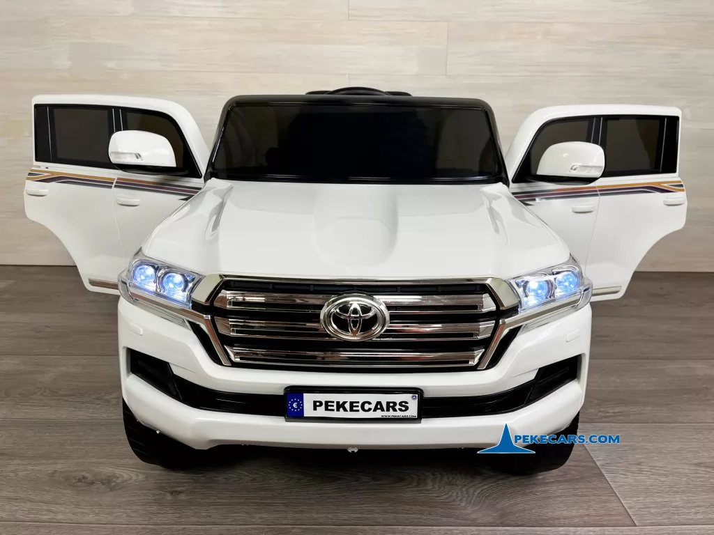 coches electricos para niños toyota land cruiser 12v blanco frente puertas