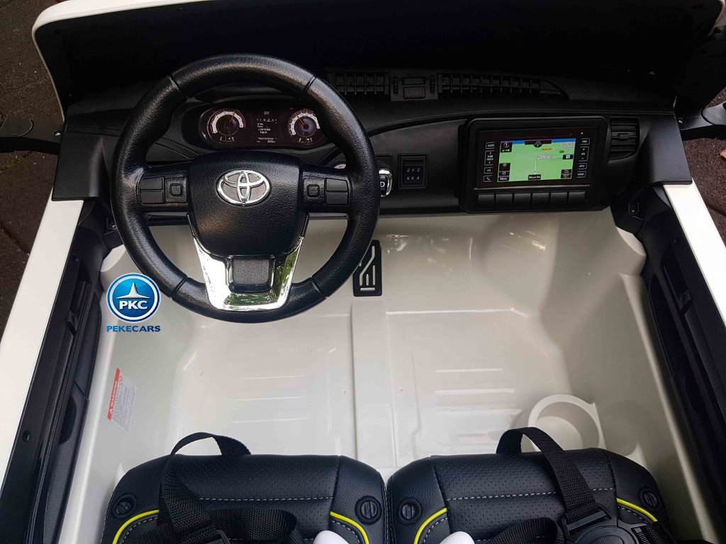 Toyota Hi-lux 12v 2,4Ghz blanco vista cuadro de mando