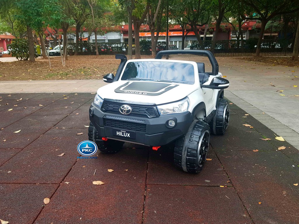 Toyota Hi-lux 12v 2,4Ghz blanco vista de lado