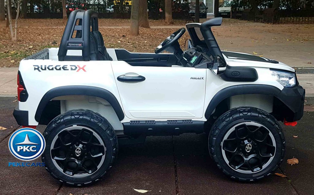 Toyota Hi-lux 12v 2,4Ghz blanco vista lateral derecho