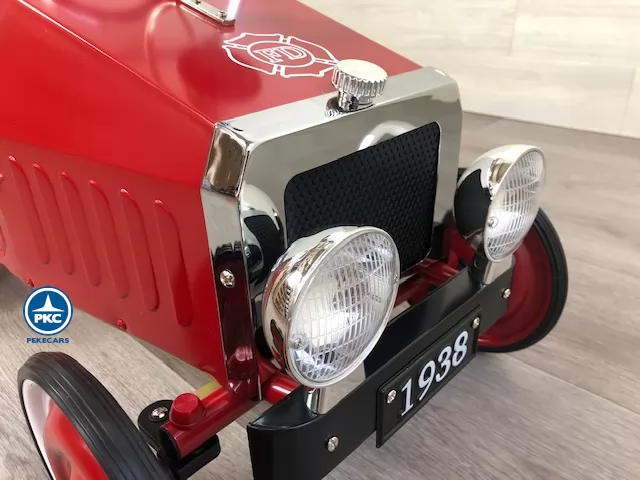 Coche de bomberos de metal rojo faros