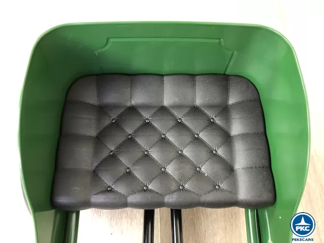 Coche de metal verde asiento