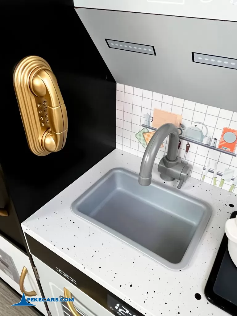 cocina de juguetes cafetera negra accesorios detalle fregadero