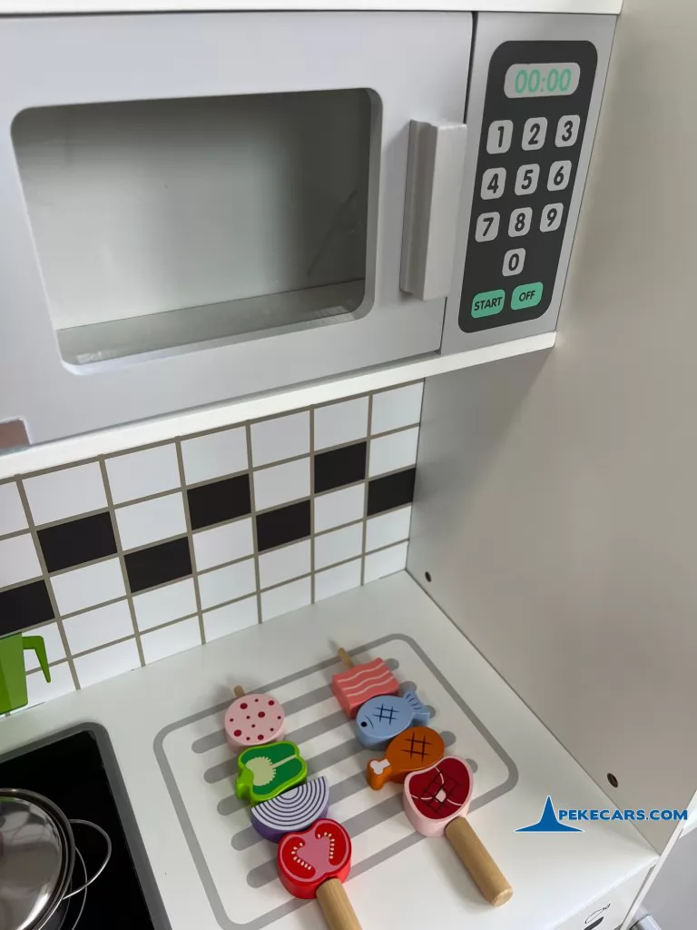 cocina de juguete gris blanca
