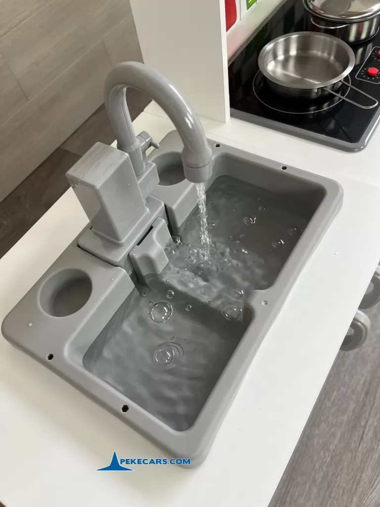 cocina de juguete gris blanca