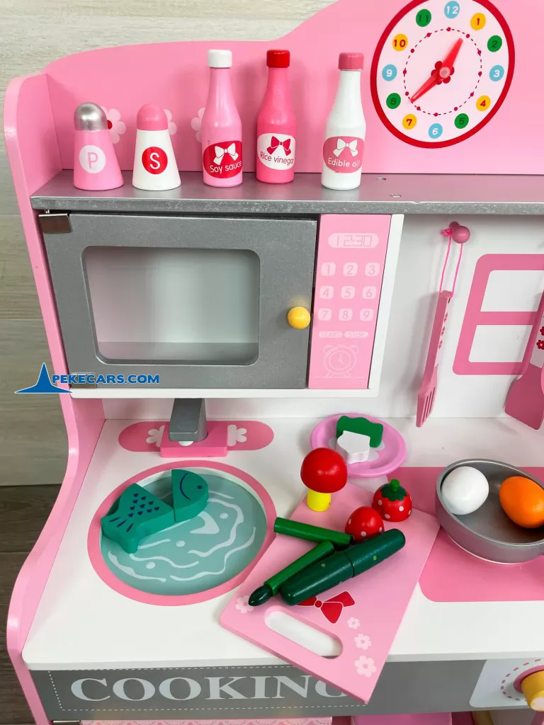 cocina de juguetes rosa vista detalle elementos