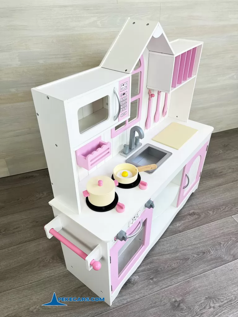 cocina de juguete blanco rosa