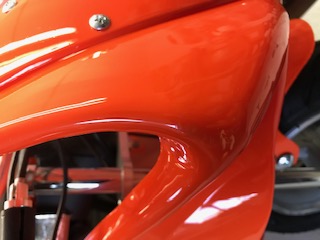 Moto ducati naranja desperfecto