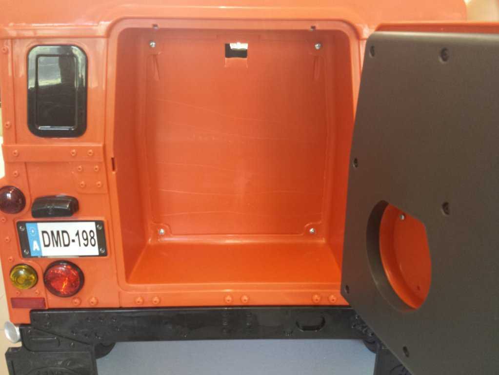 Todoterreno electrico para niños Land Rover Defender Naranja porton trasero