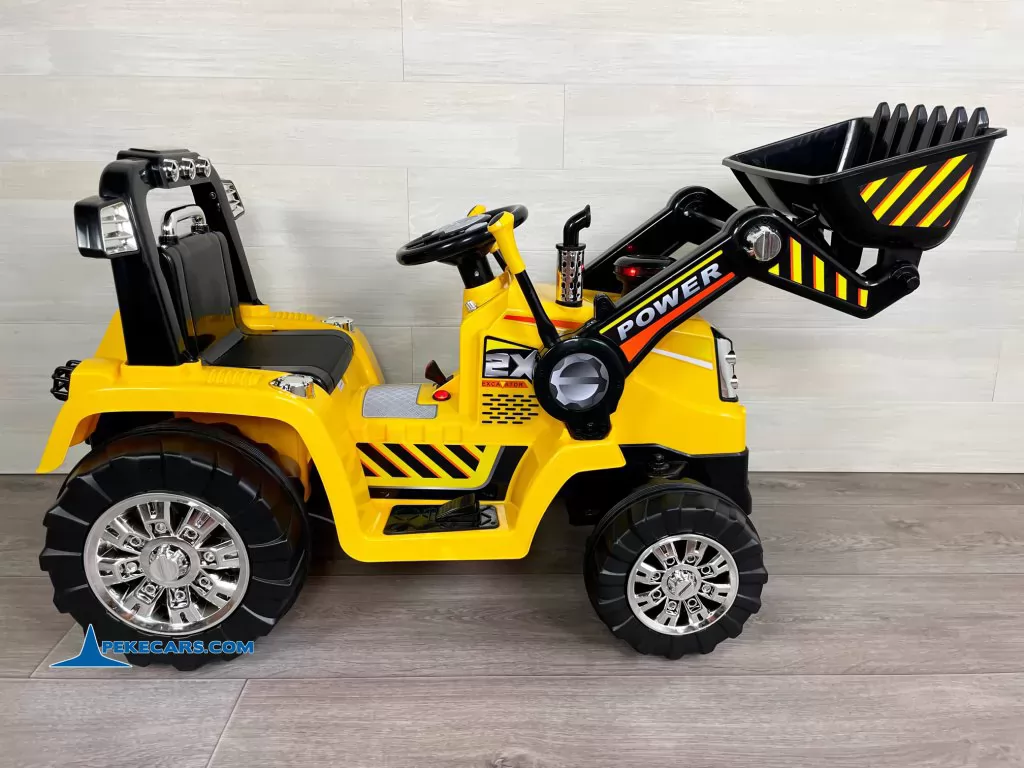 tractor de bateria peketrac 1005 12v amarillo vista izquierda detalle