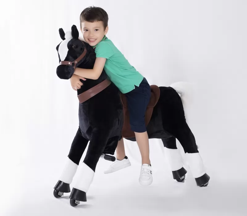Pekepony Napoleon Mediano con niño montado