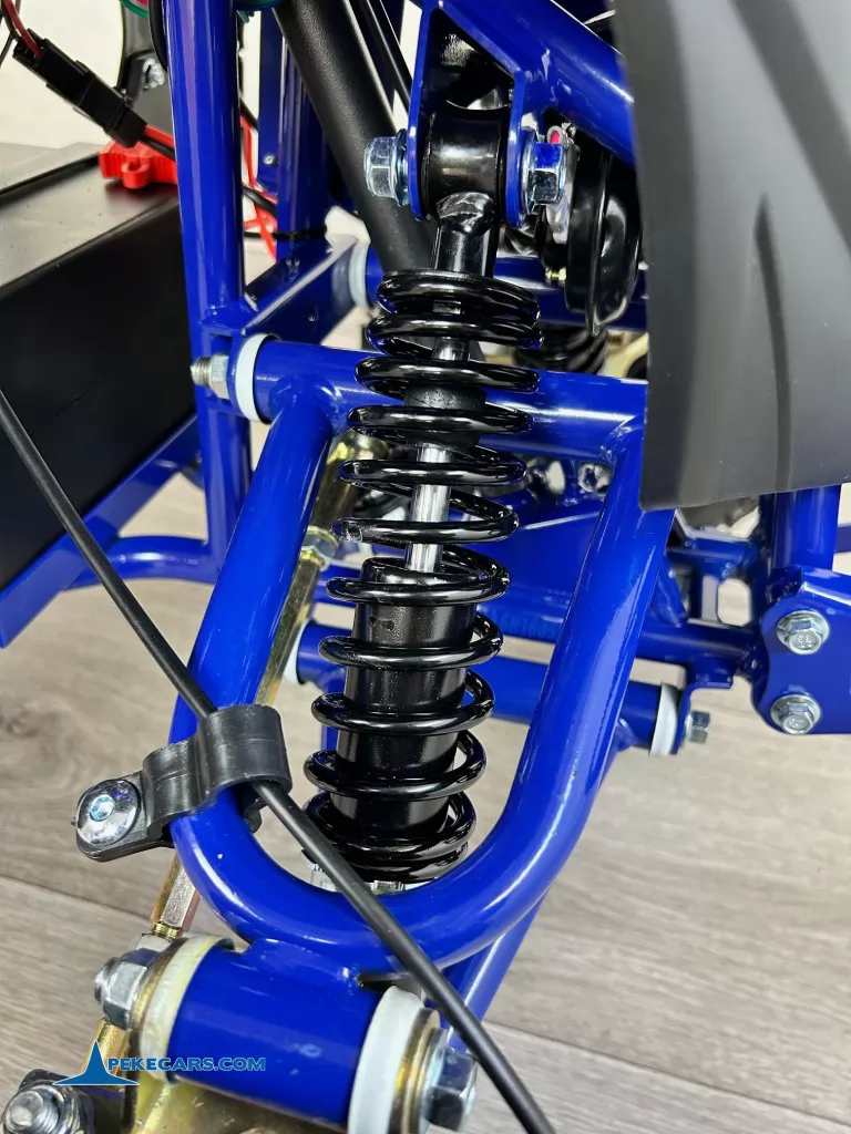 Quad Avenger 48V 1000W Azul amortiguador trasero