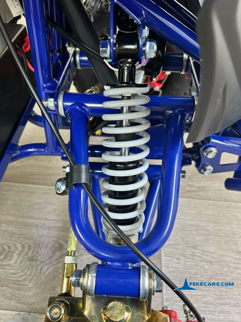 Quad Avenger 48V 1000W Azul para niños amortiguador