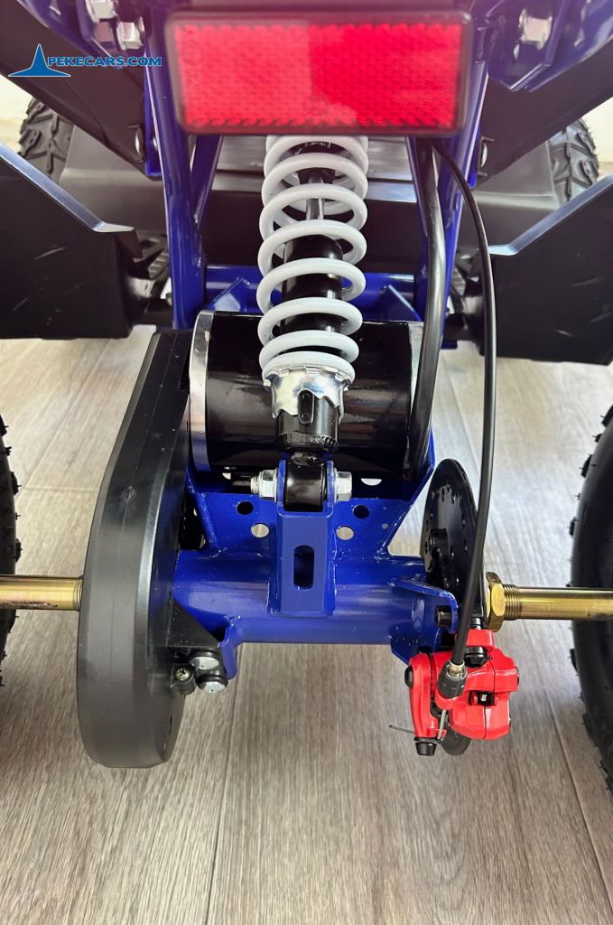Quad Avenger 48V 1000W Azul para niños amortiguador trasero