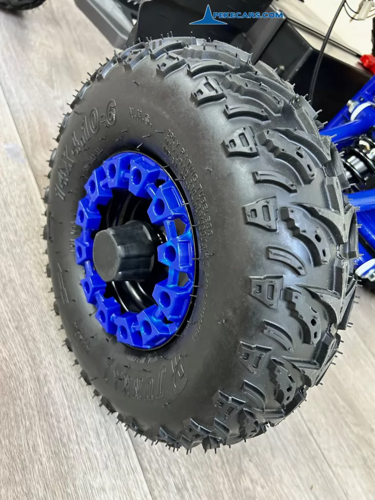 Quad Avenger 48V 1000W Azul para niño ruedas neumaticas