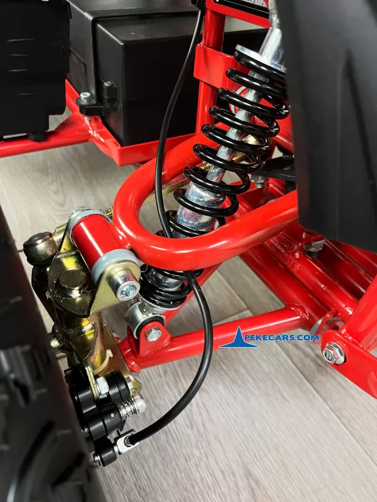 Quad Avenger 48V 1000W Rojo amortiguador