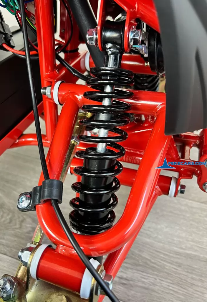 Quad Avenger 48V 1000W Rojo suspension trasera