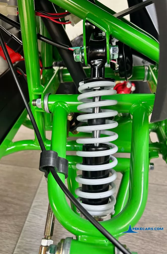 Quad Avenger 48V 1000W Verde amortiguador