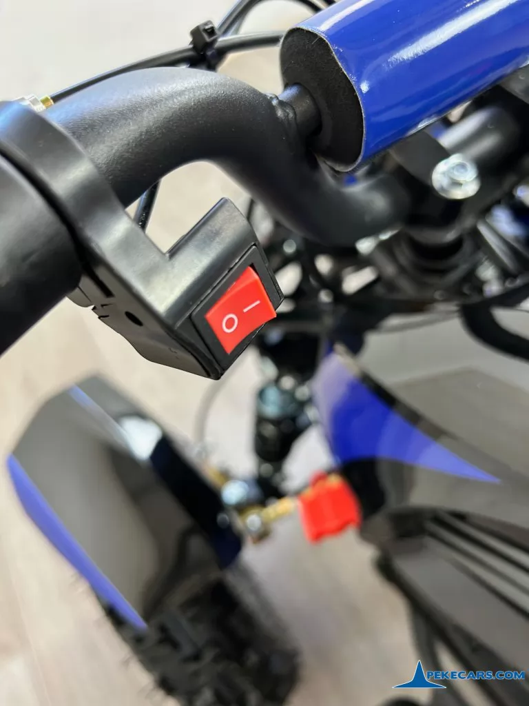 Quad Cobra 36V 800W Azul boton de parada
