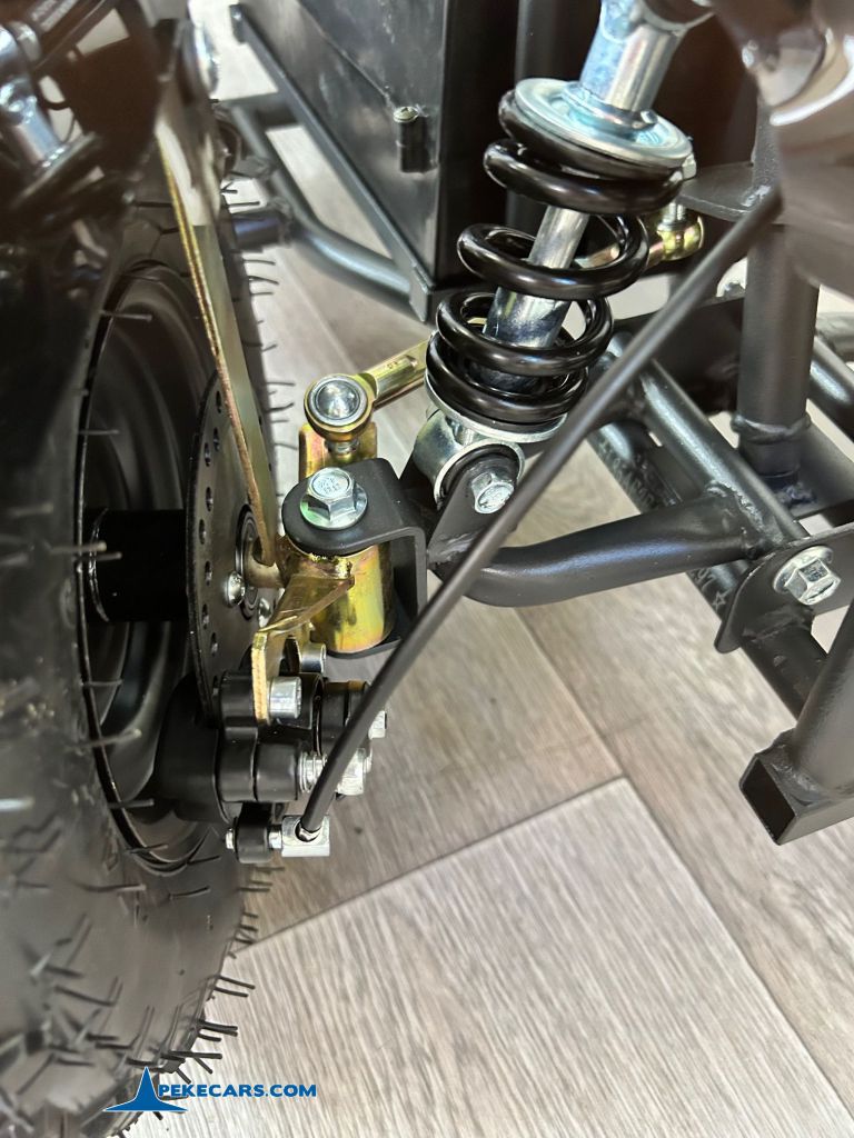 Quad Cobra 36V 800W Blanco amortiguador