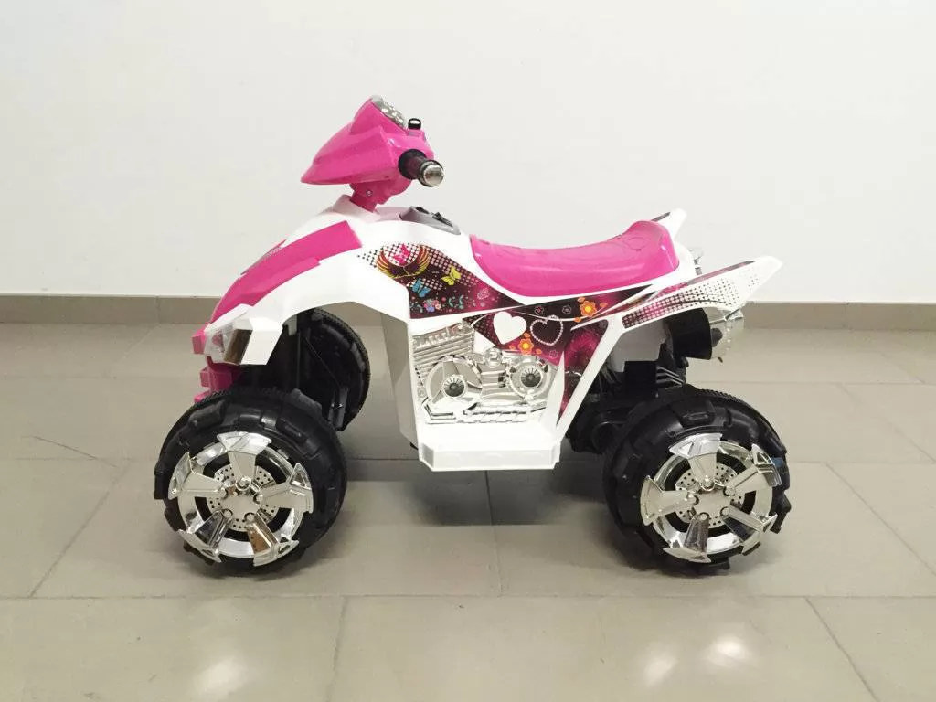 Quad eléctrico infantil Pekecars doble velocidad Rosa lateral