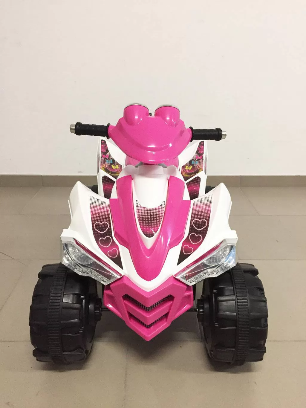 Quad eléctrico infantil Pekecars doble velocidad Rosa frontal