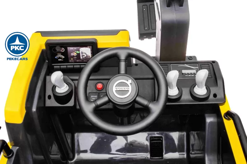 tractor de bateria excavadora volvo amarilla